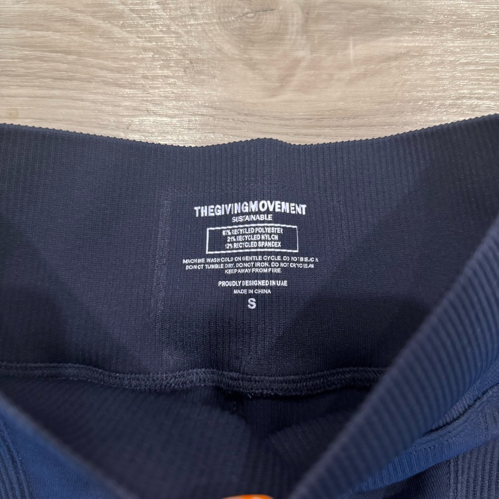 The Giving Movement Ribbed Flared Leggings in Navy - Picture 7 of 7